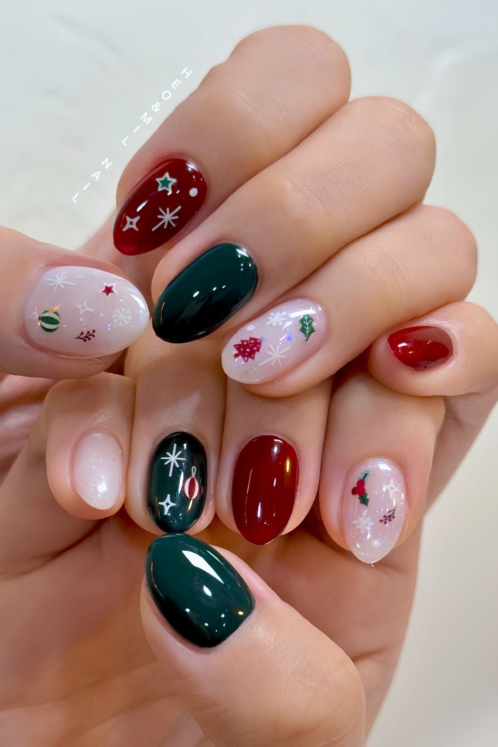 Red and green manicure with micro Christmas art
