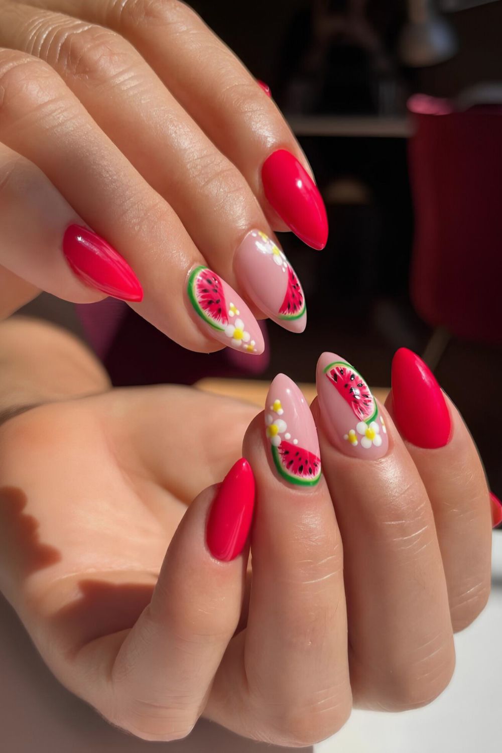 Red nails with watermelon and floral art
