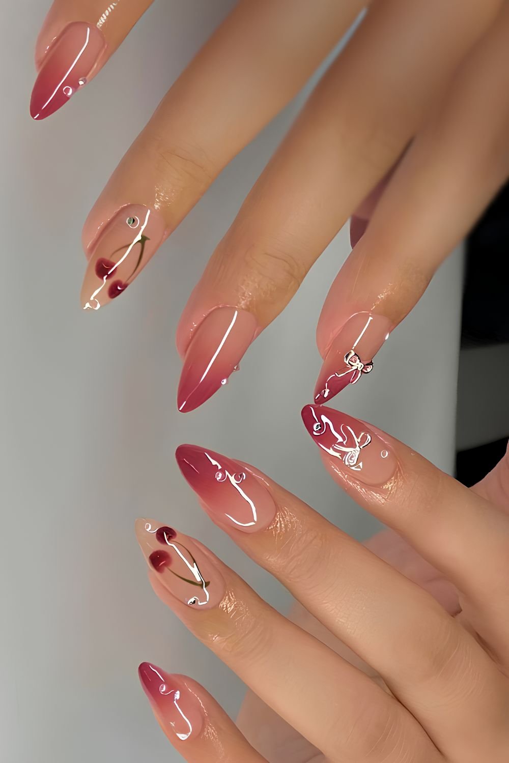 Red ombre nails with cherries