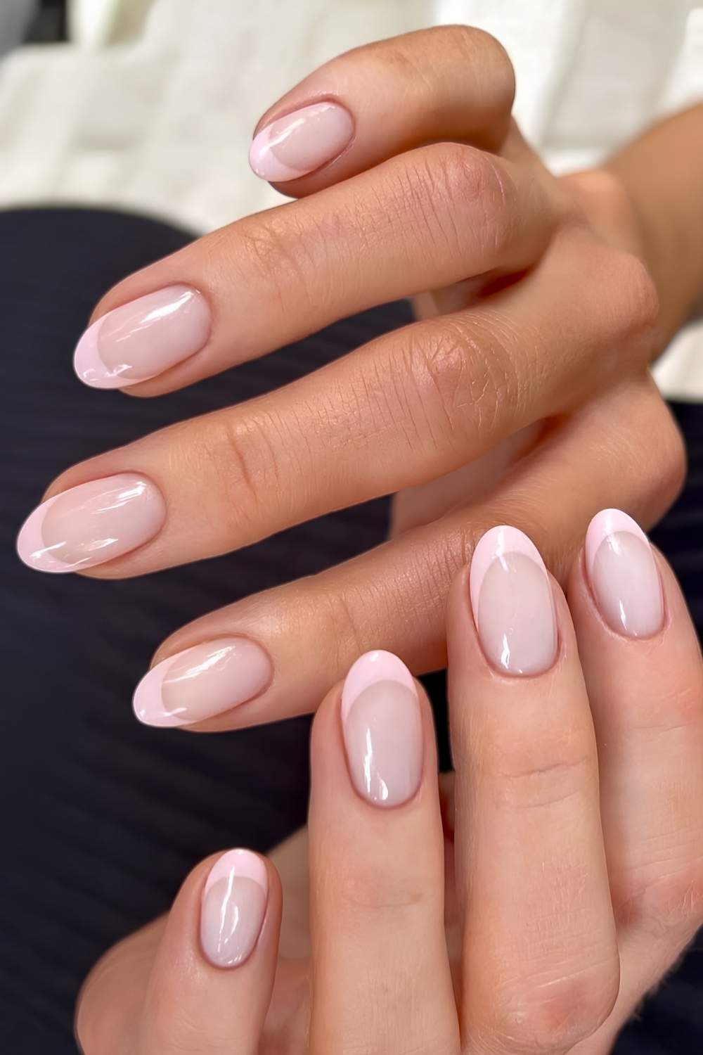Round pink French tip nails