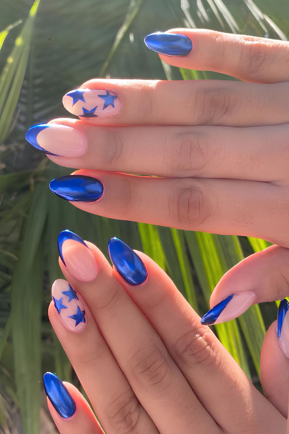 Royal blue chrome nails with stars