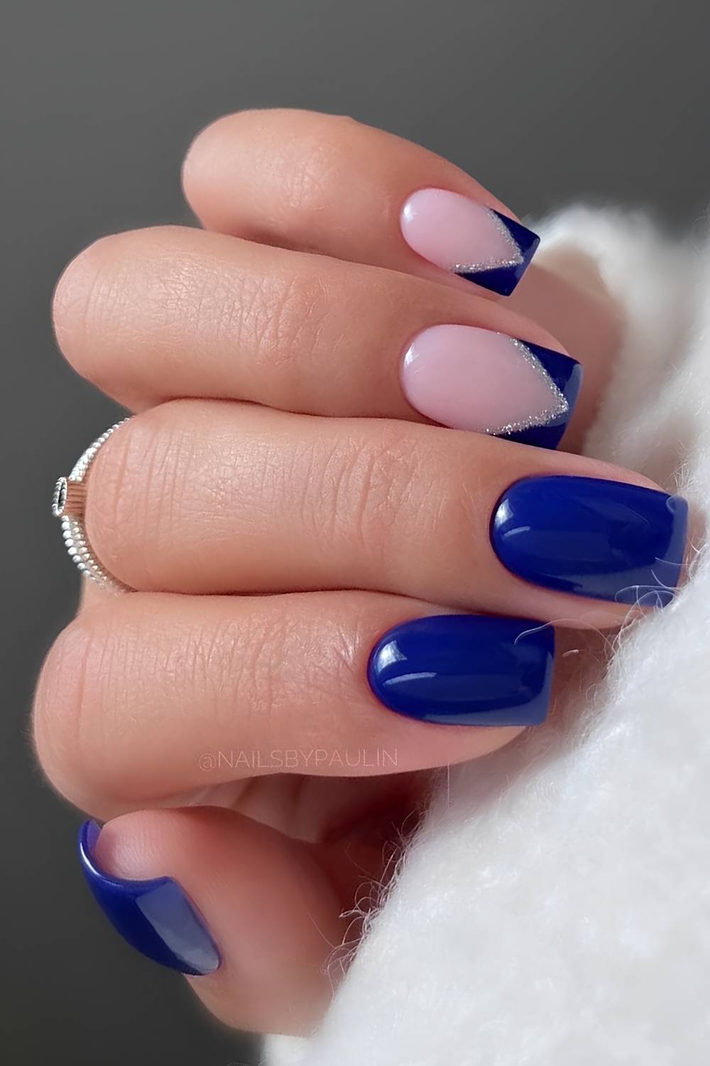 Royal blue nails with accent silver glitter