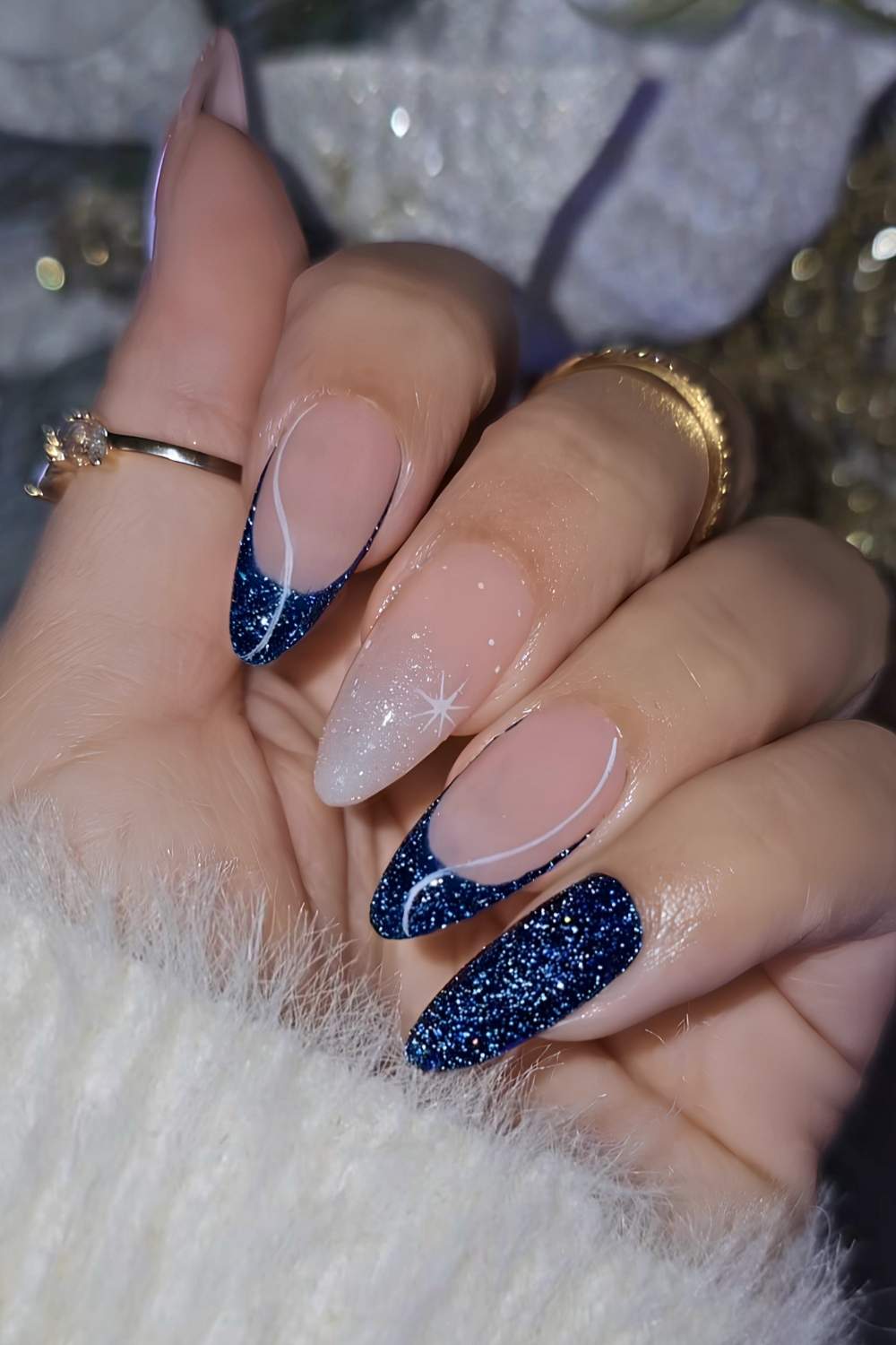 Shimmery dark blue nails with white line art