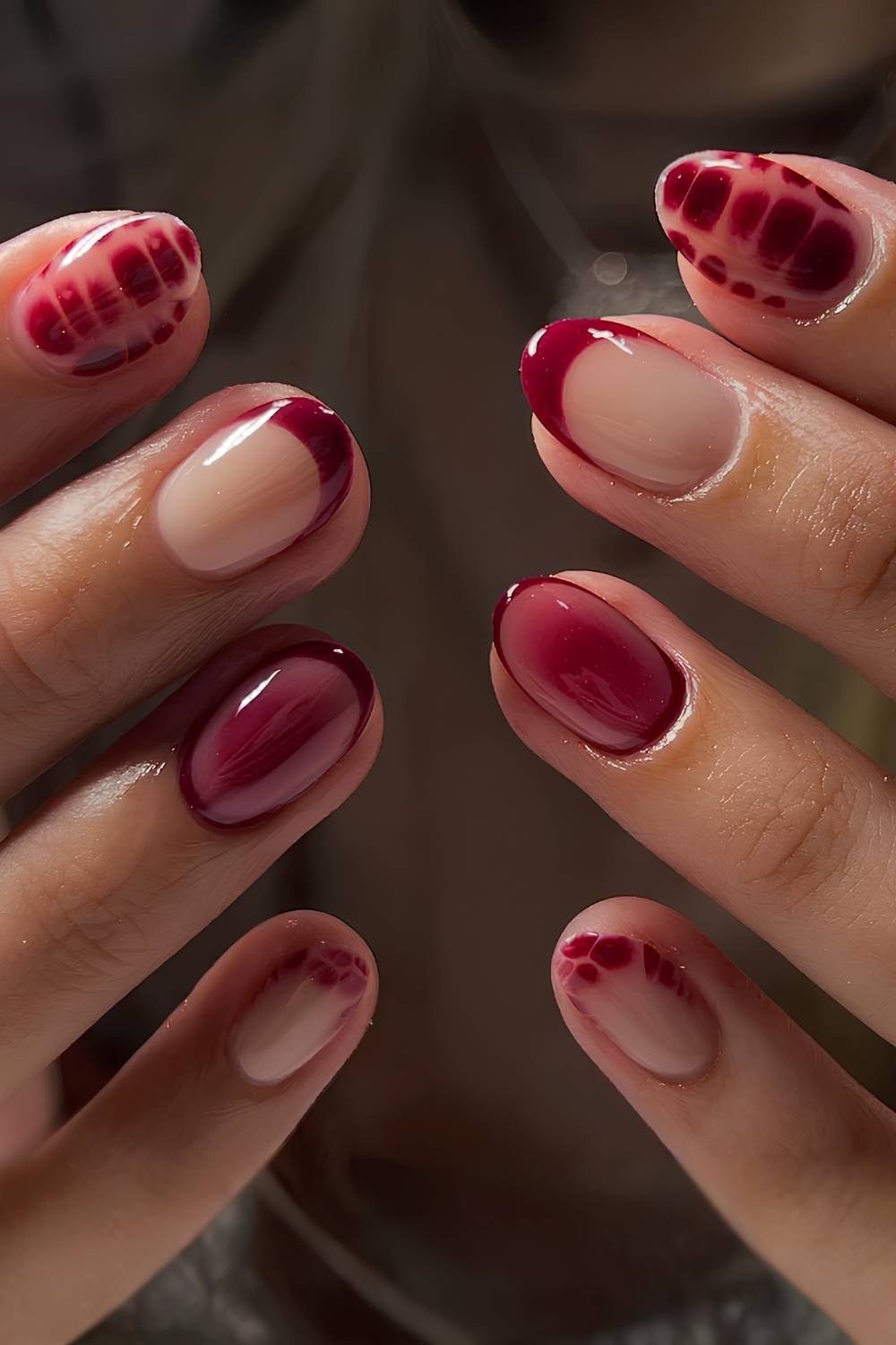 Short burgundy mix and match nails