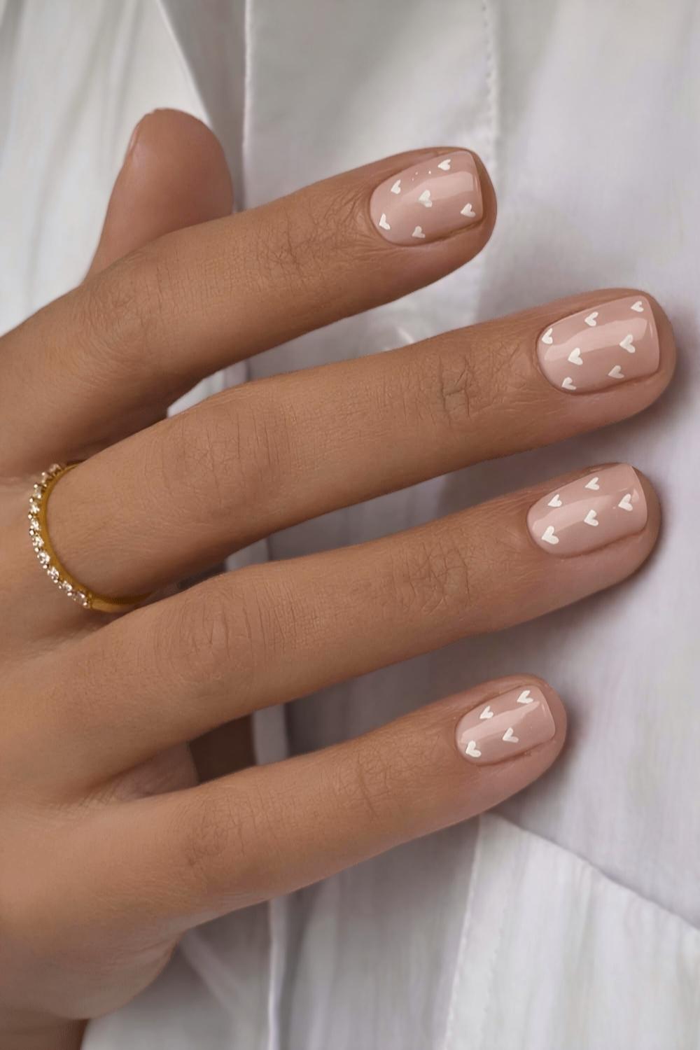Short milky white nails with hearts