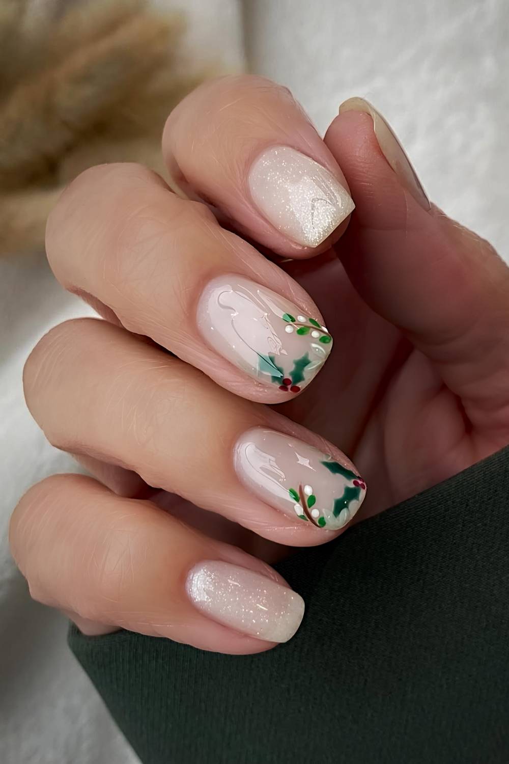 Short milky white nails with mistletoe art