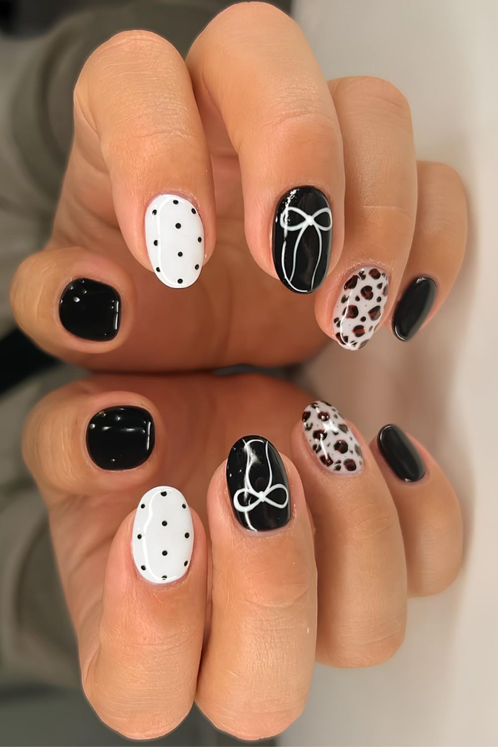 Short mix and match nails in black, white and animal print