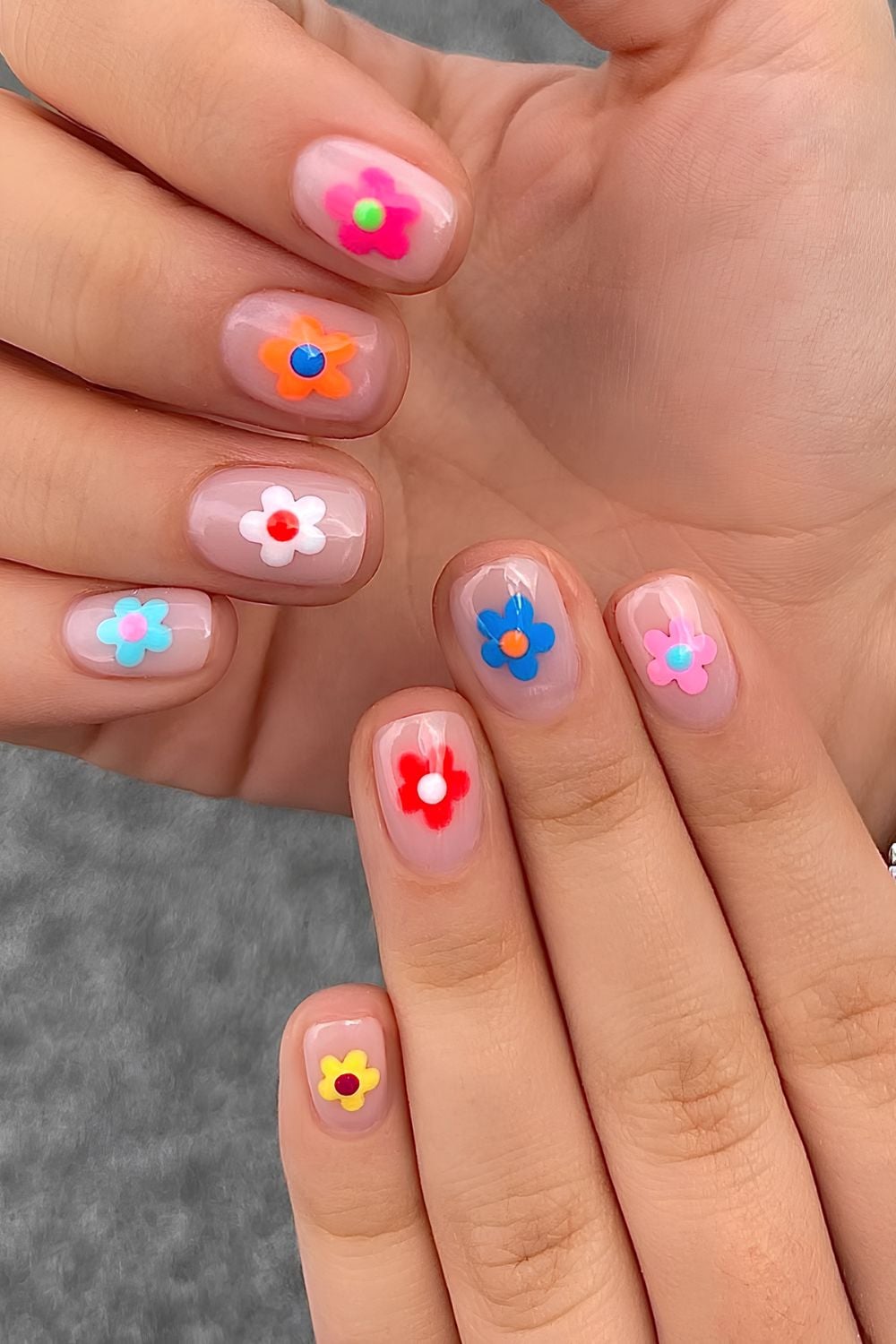 Short nails with colorful chunky flower designs