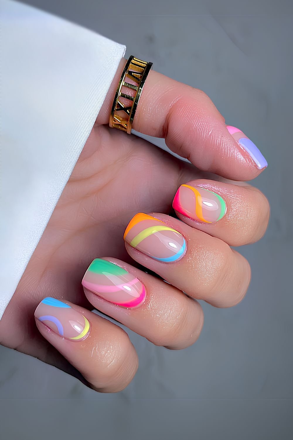 Short nails with colorful swirls