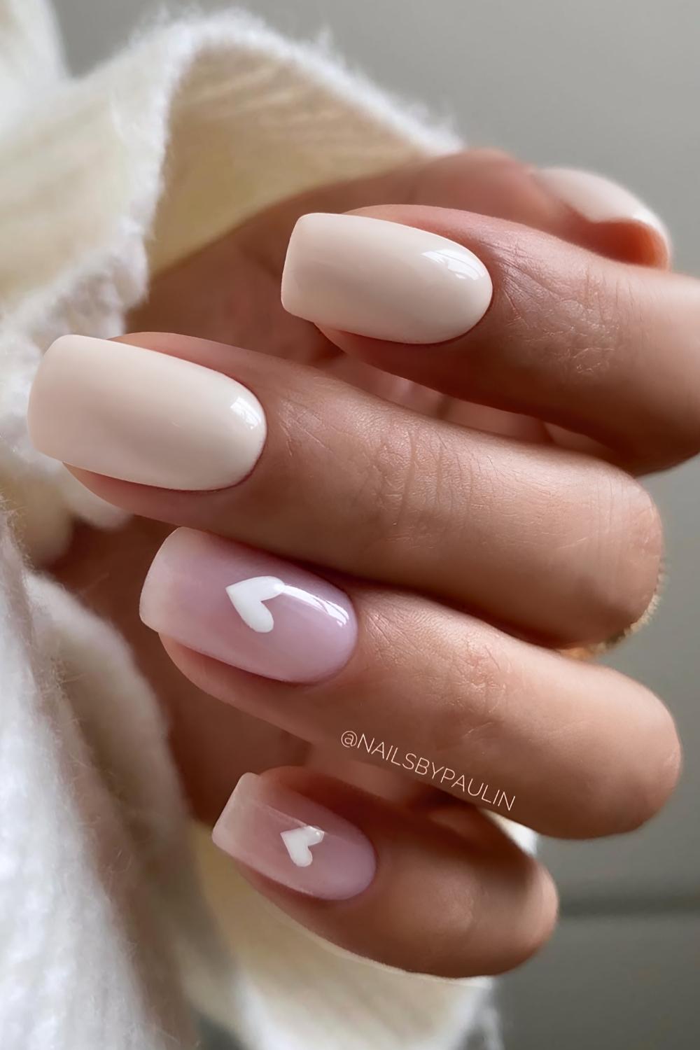 Short neutral mani with accent hearts