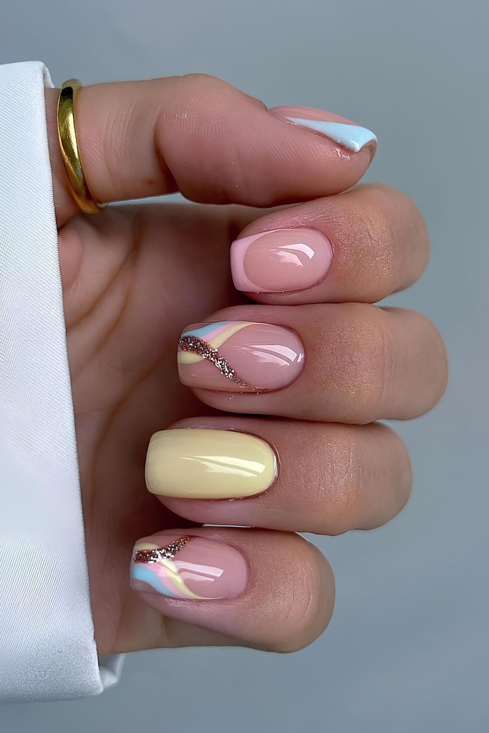 Short pastel spring swirl nails