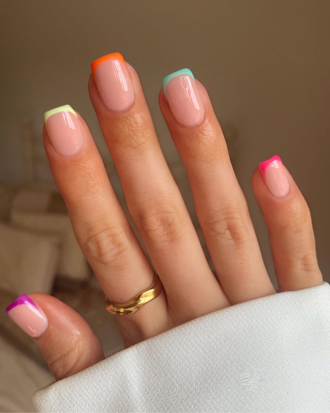 Short skittle French tip nails
