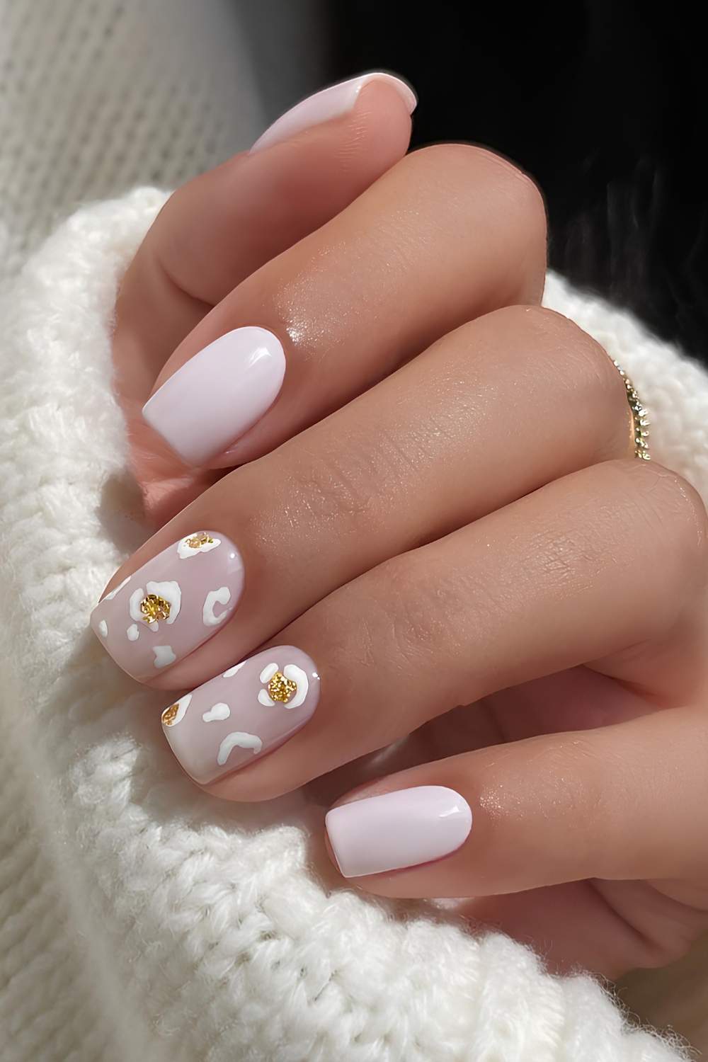 Short white mani with leopard print accent