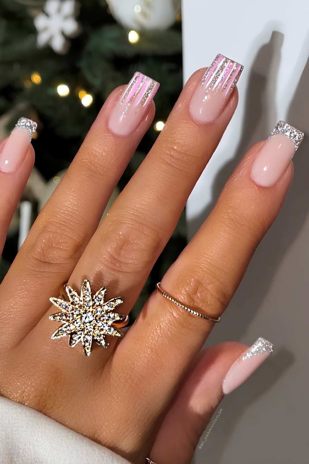 Silver Christmas nails with pink accents