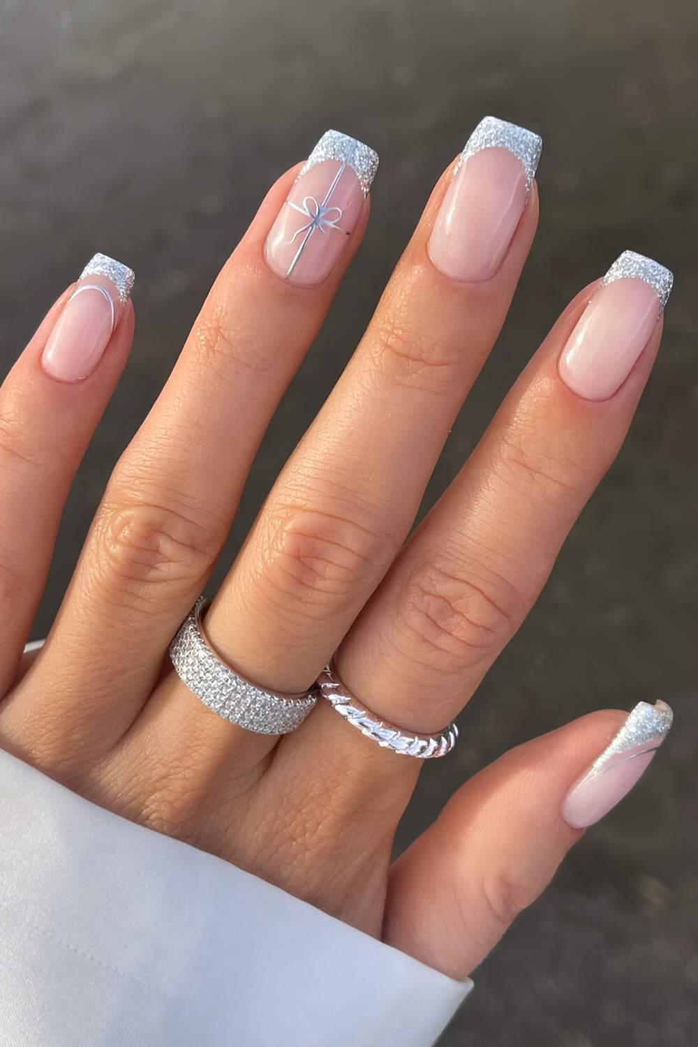 Silver glitter French mani with gift bow art