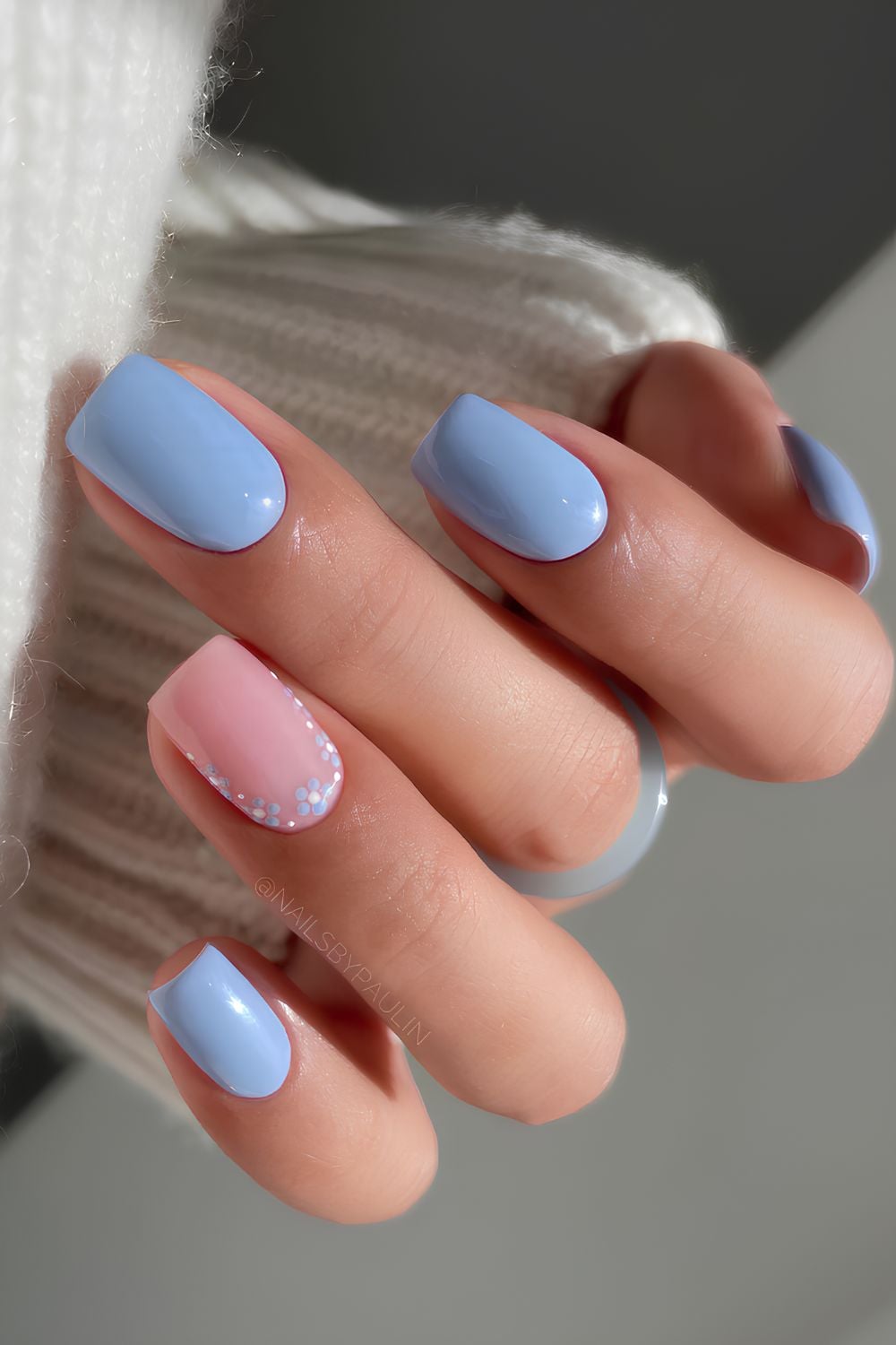 Sky blue nails with tiny flowers