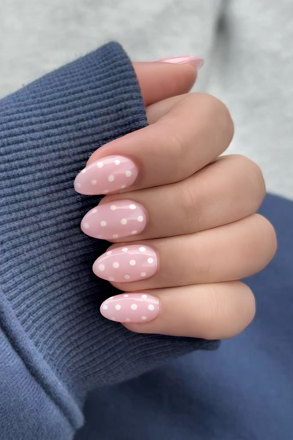 Soft pink mani with white polka dots