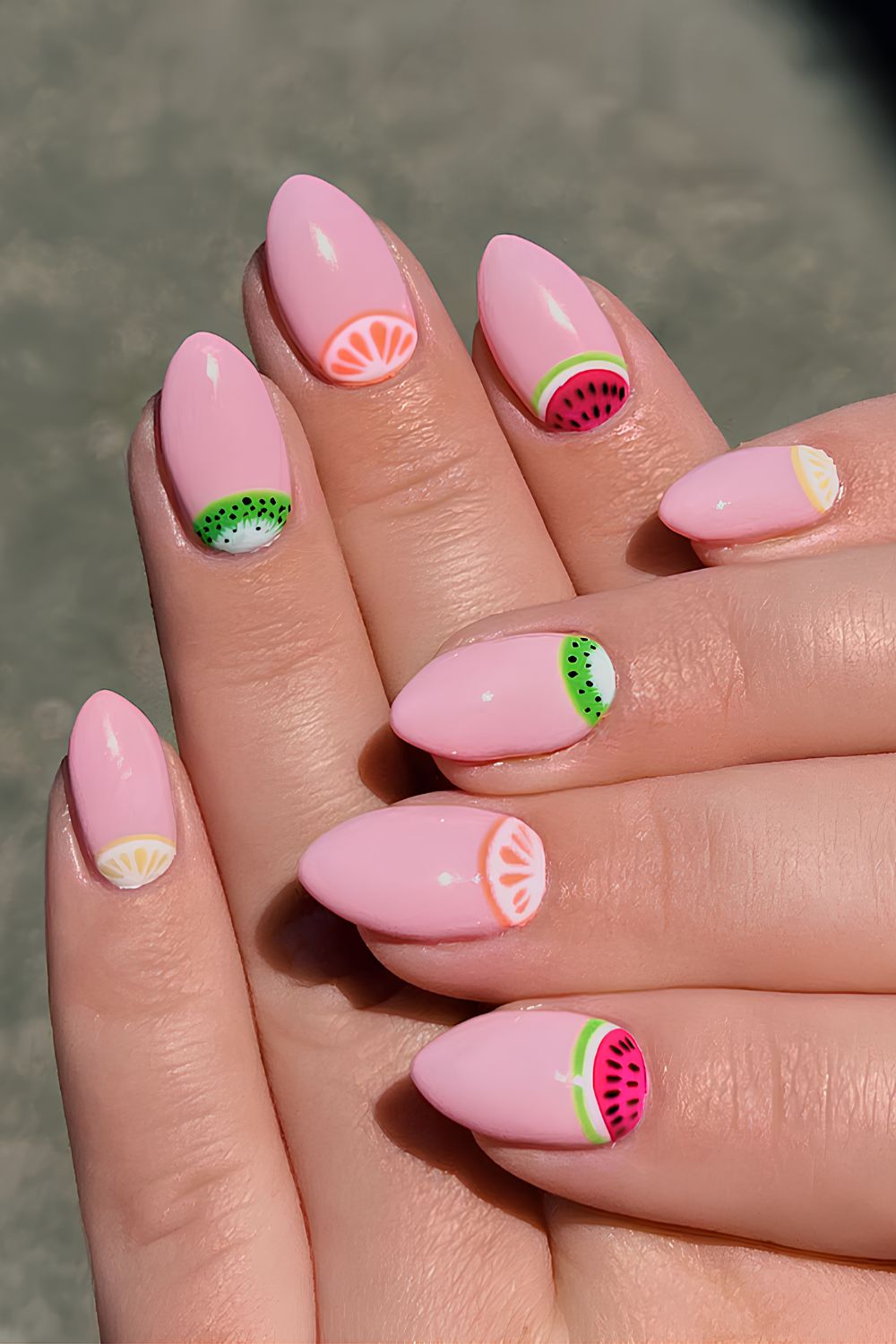 Soft pink nails with fruity art on cuticles