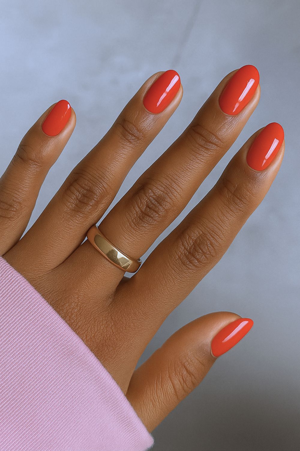 Solid coral red manicure