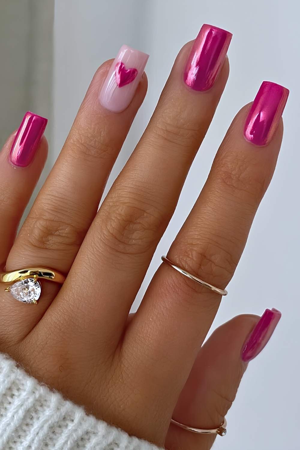 Square pink chrome mani with accent heart