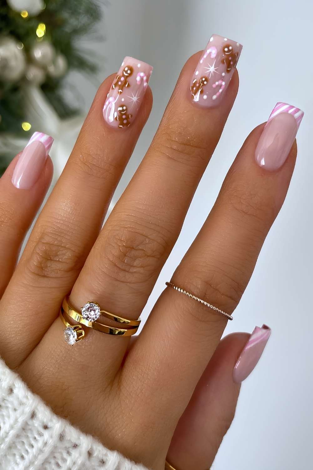 Striped pink French nails with gingerbread art
