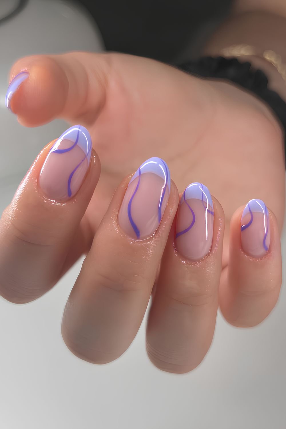 Swirly lavender French tip nails