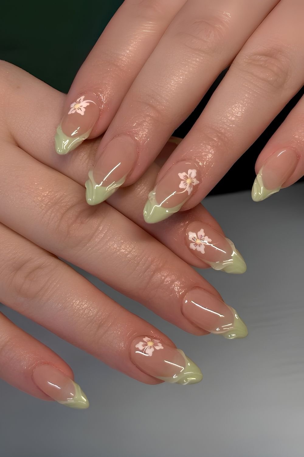 Textured green French tips with hibiscus flowers