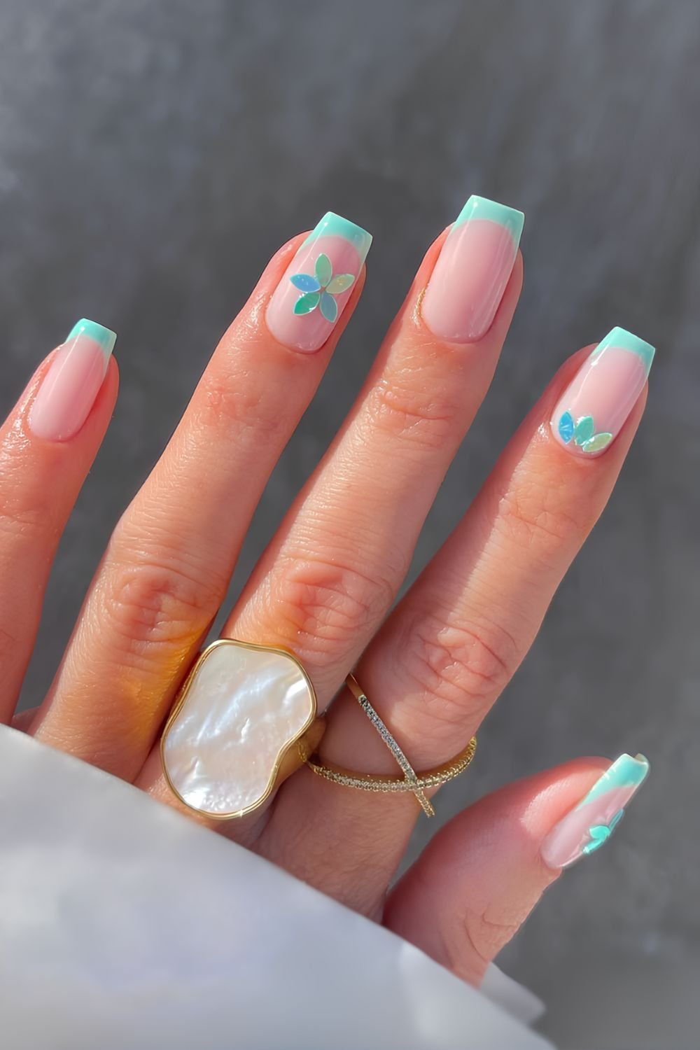 Tiffany blue french tips with floral accents