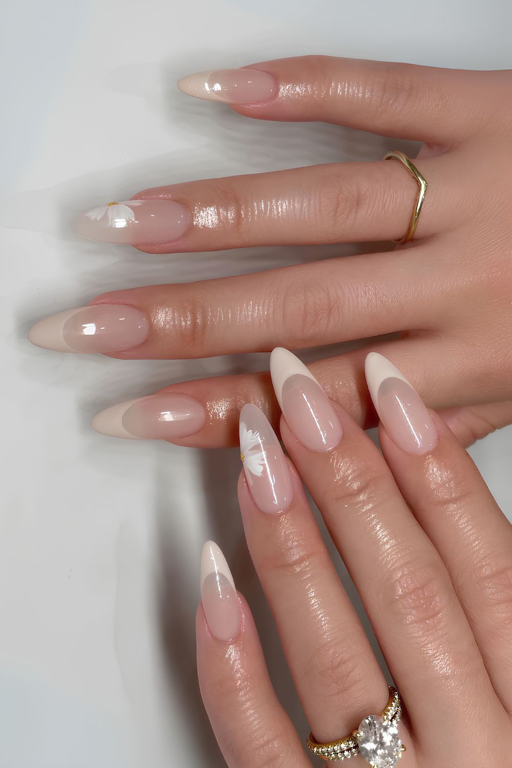 Vanilla French nails with delicate floral art