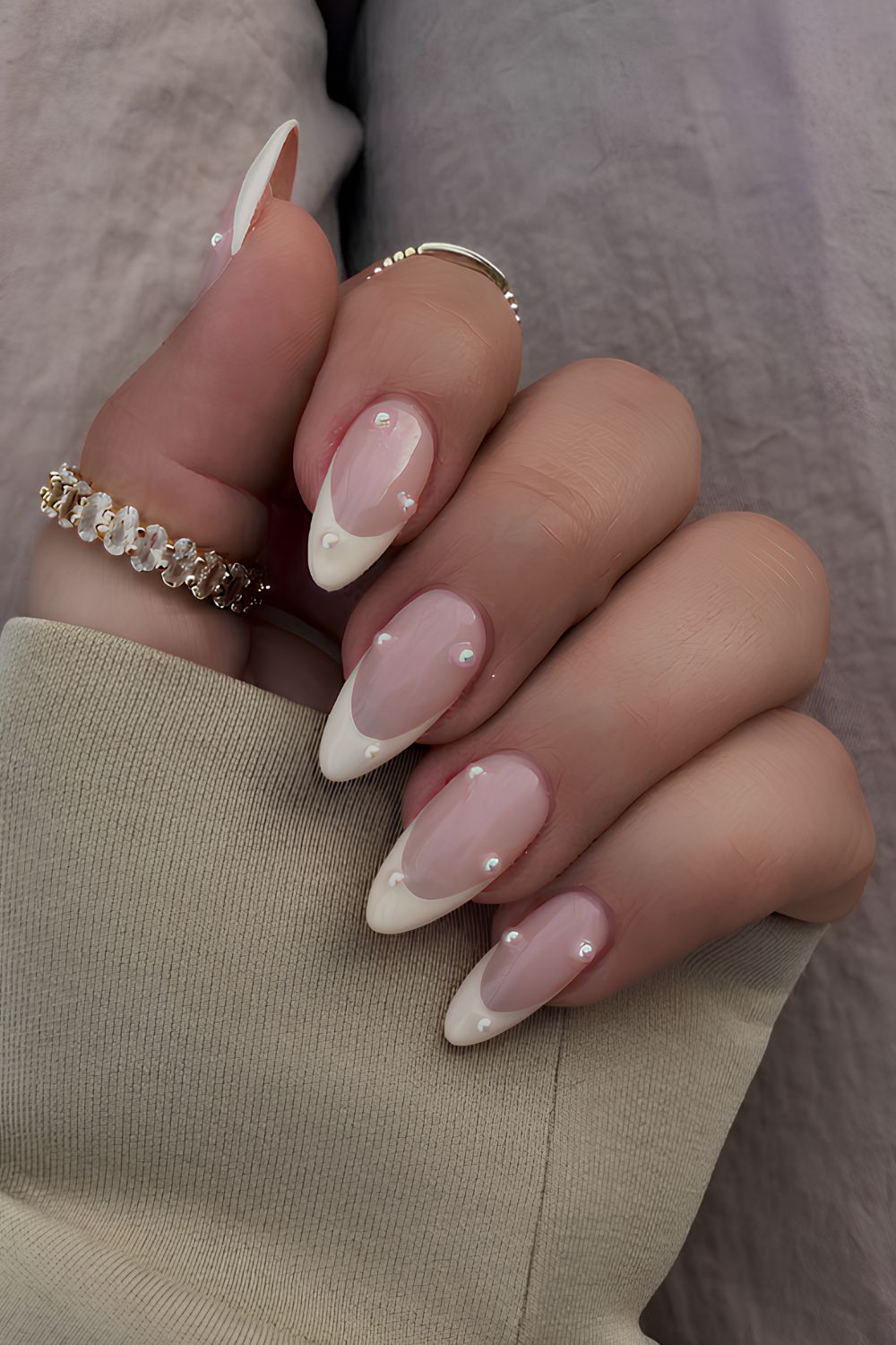 Vanilla French nails with tiny pearl accents