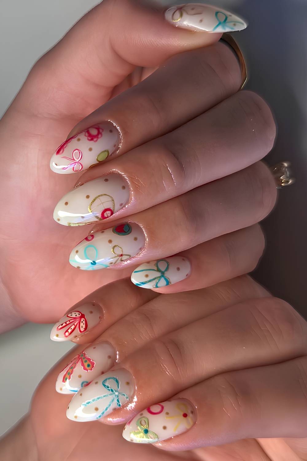 White Christmas nails with colorful bows