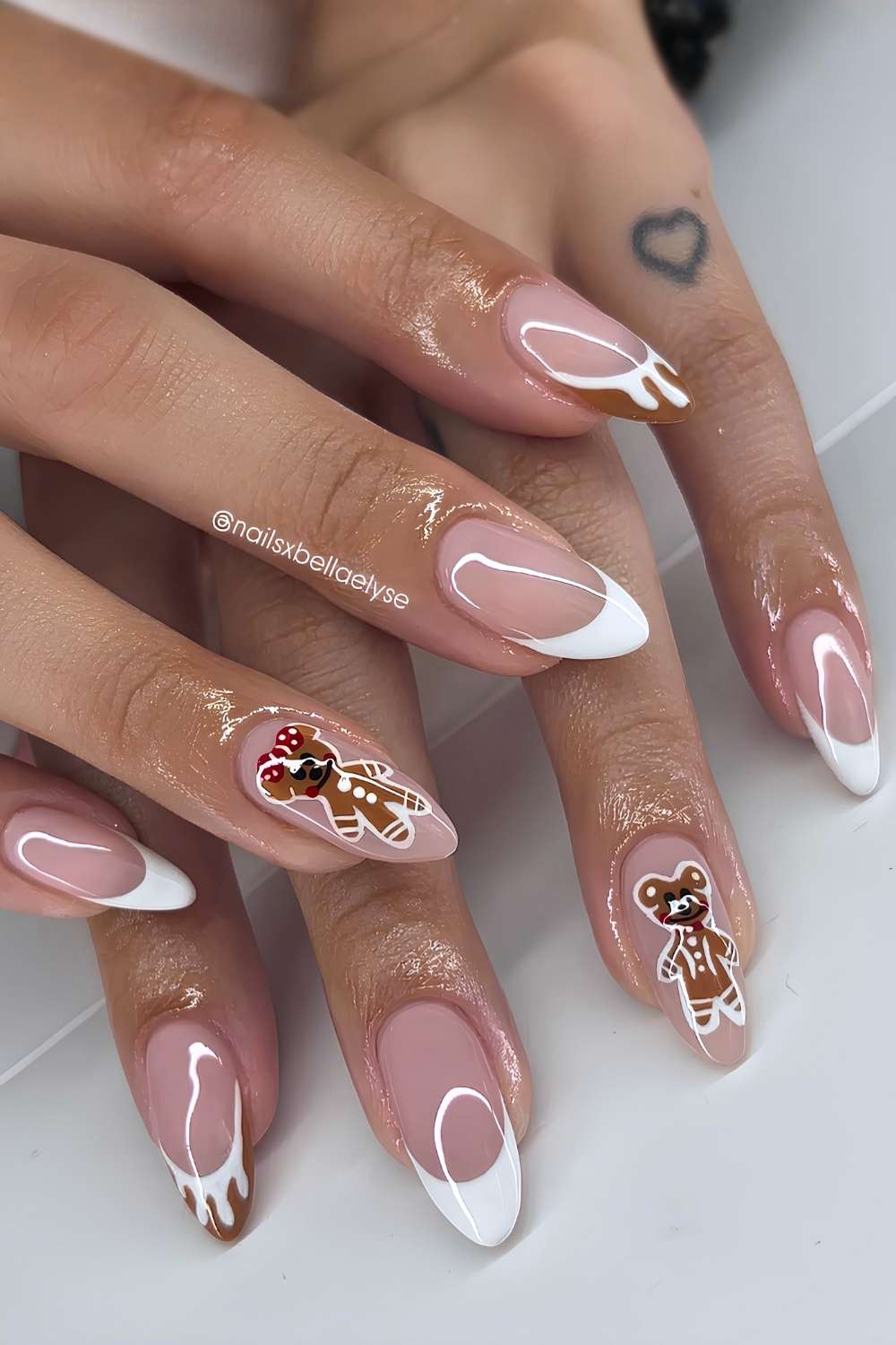 White French nails with gingerbread cookie art