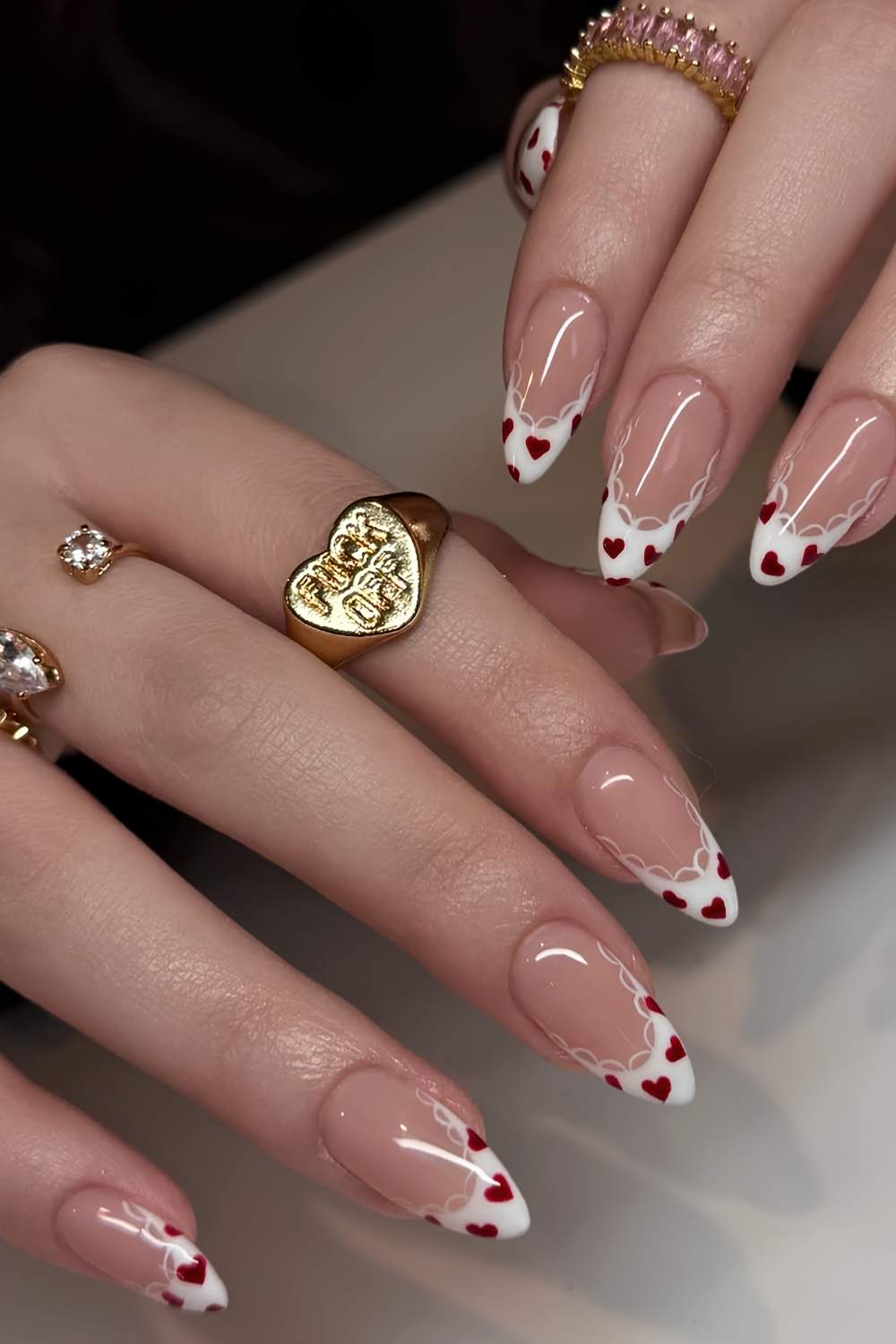 White French nails with heart and lace art