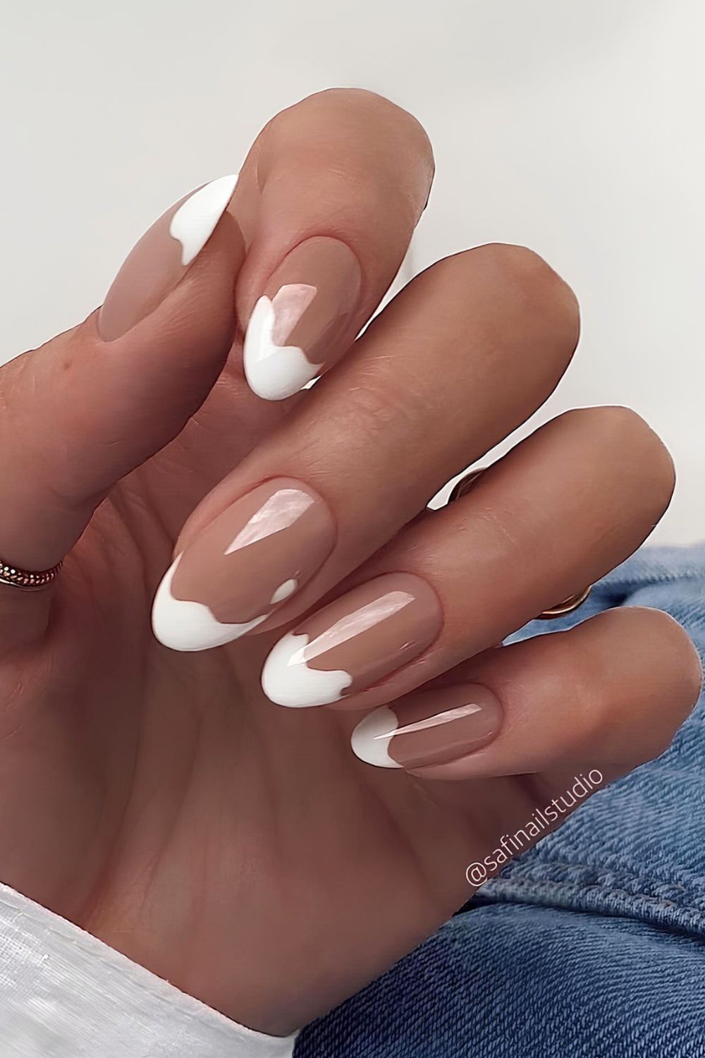 White abstract French nails with beige base