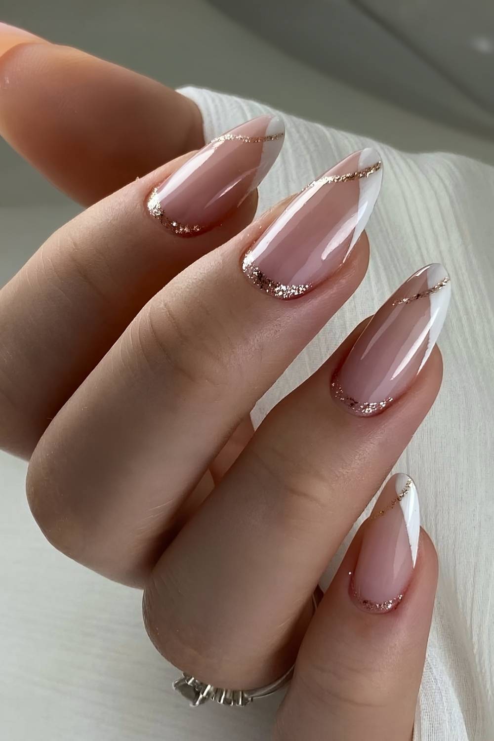 White and gold glitter french manicure