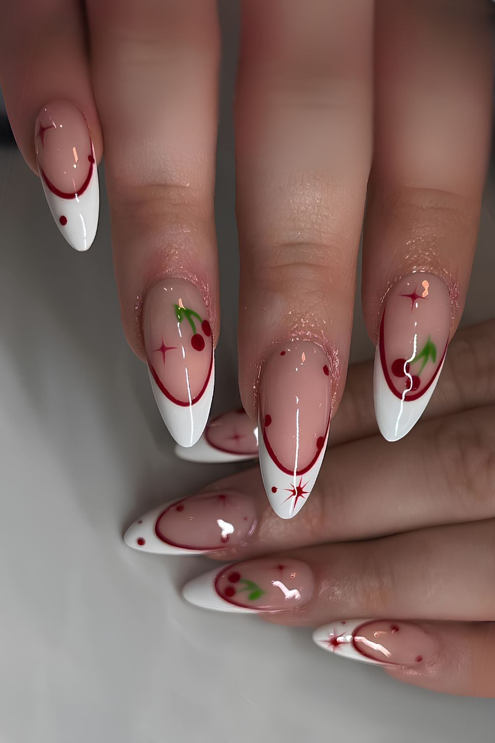 White and red French nails with vith cherries
