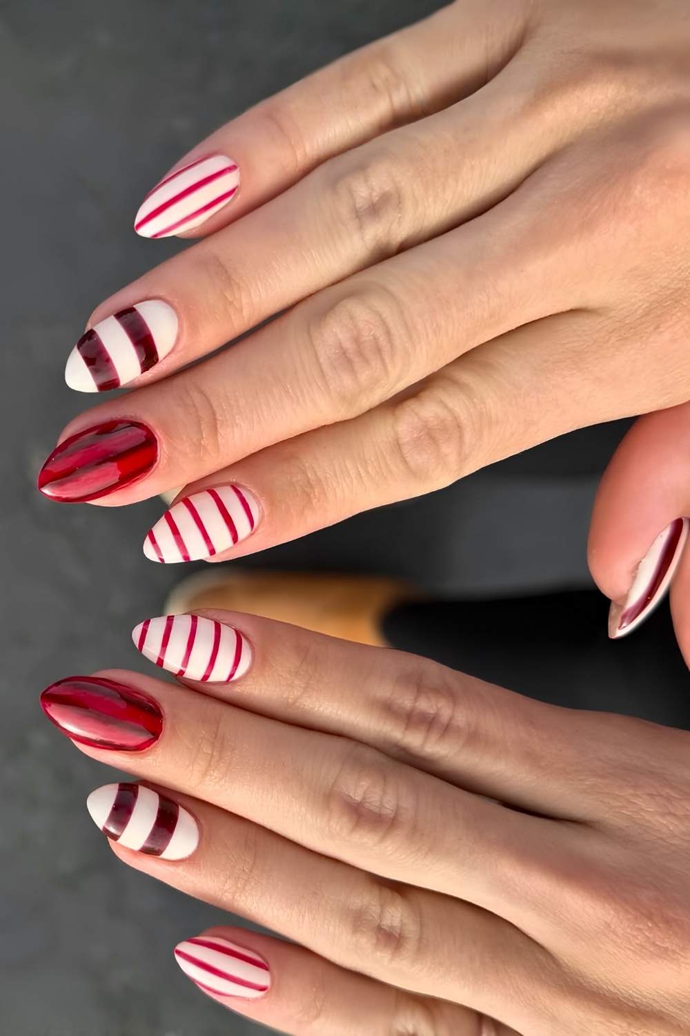White and red striped manicure