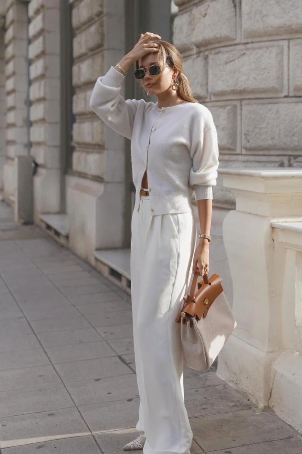 White cardigan with cream wide-leg pants