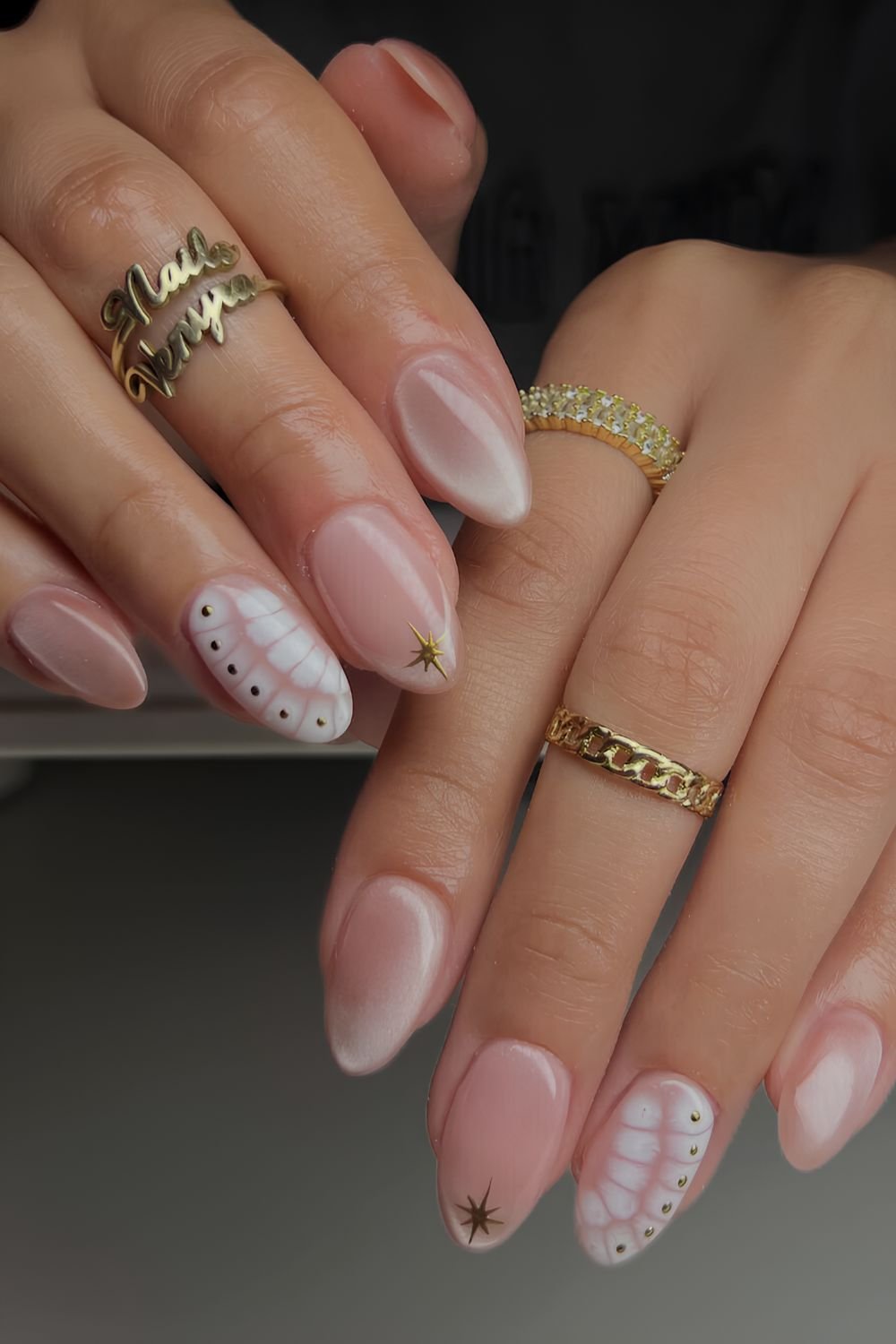 White cat eye nails with animal print