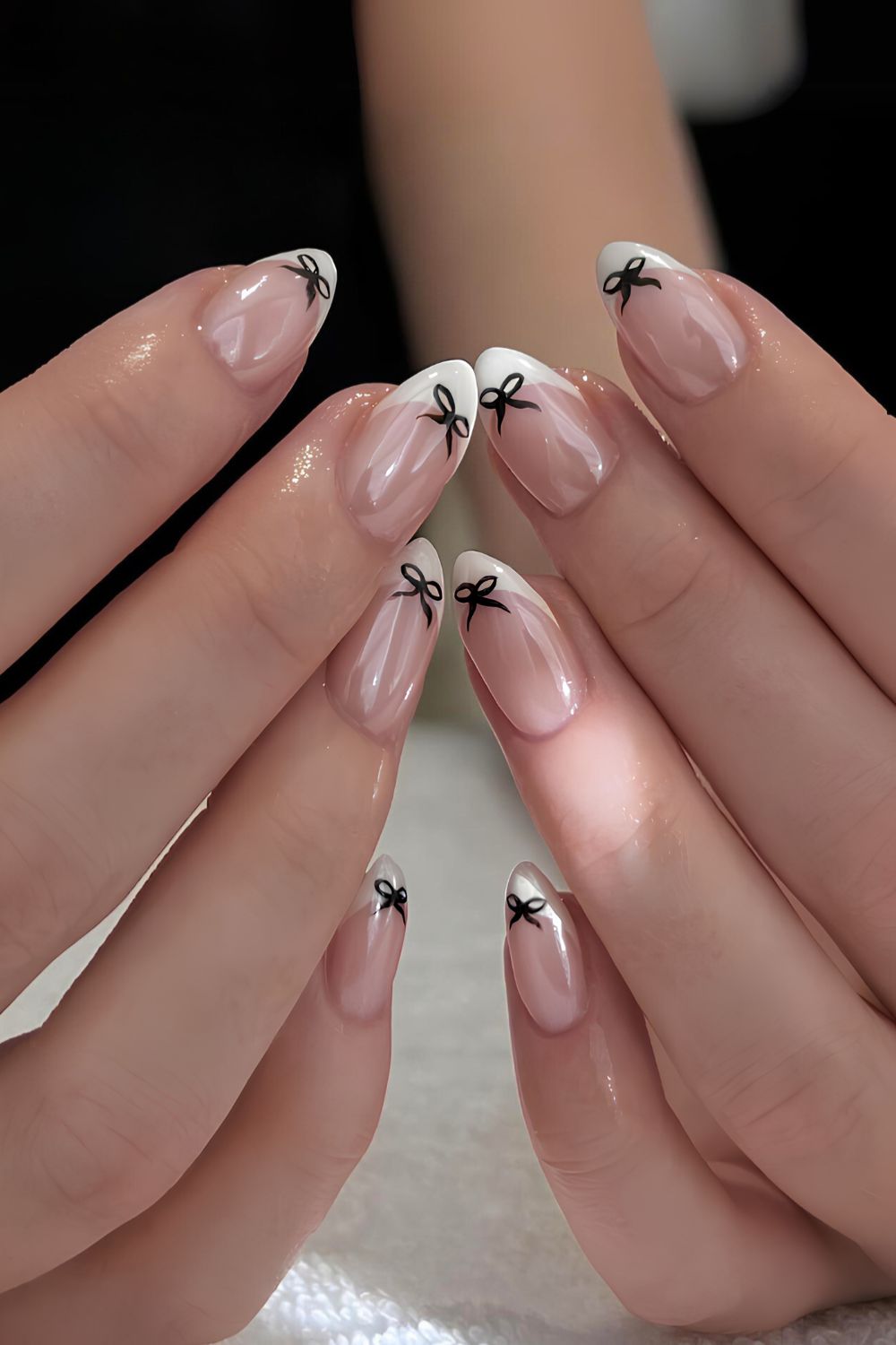White chrome French nails with bows