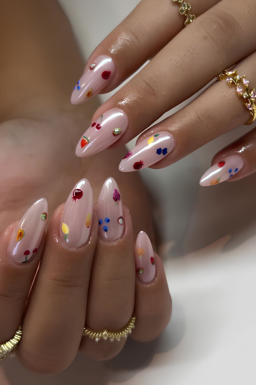 White chrome nails with fruity art