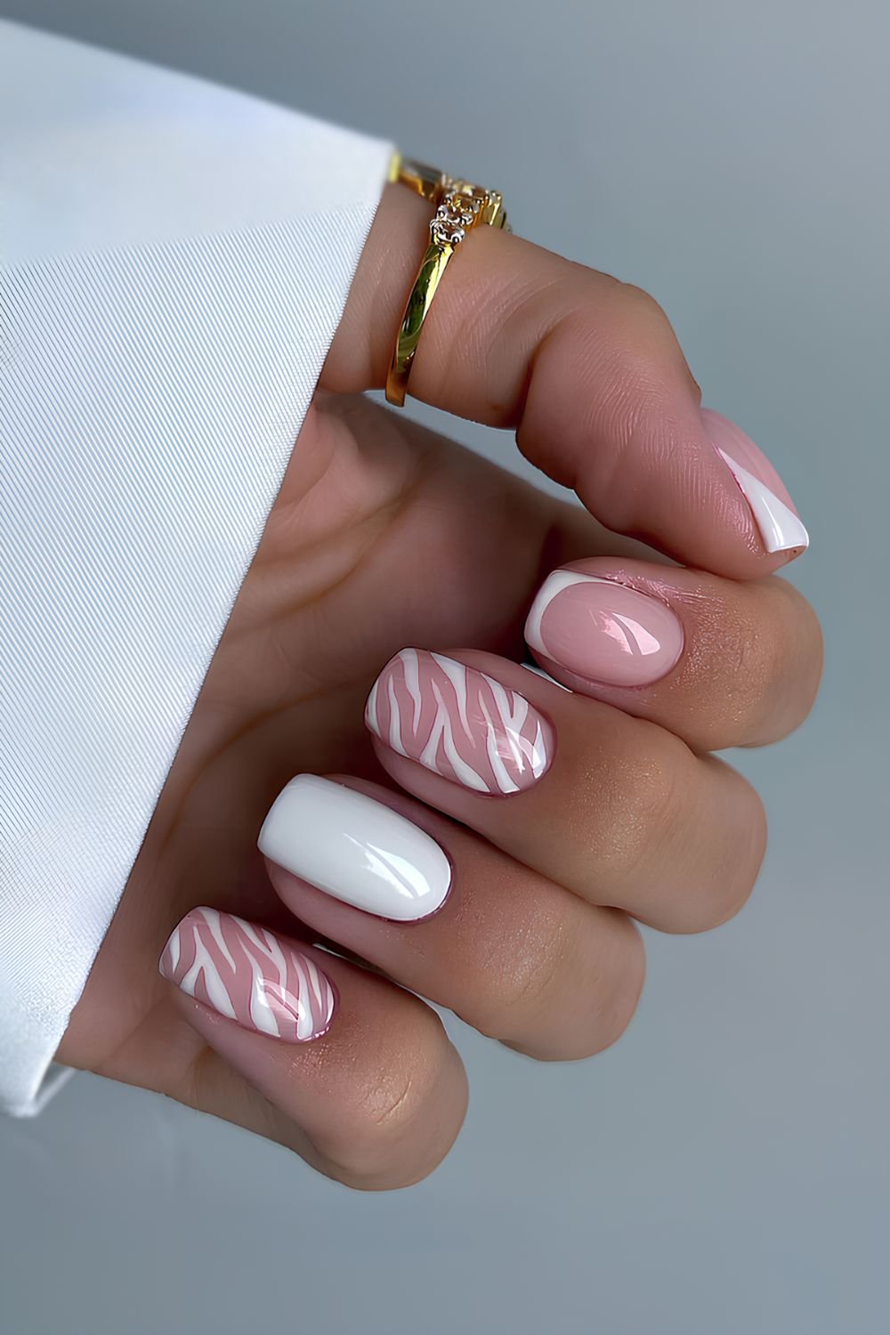 White mani with zebra print accent