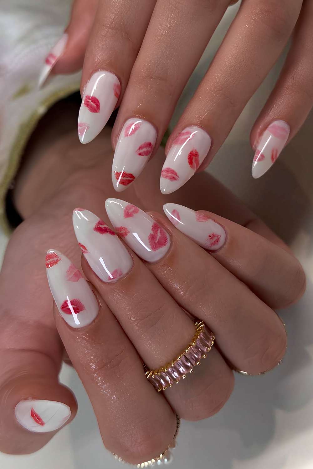 White manicure with red kiss art