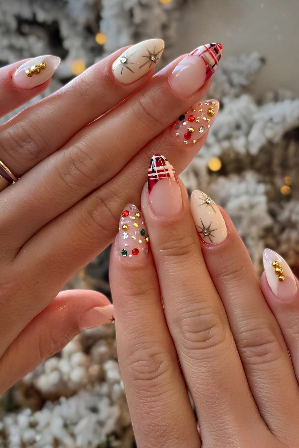 White nails with Christmas themed accents