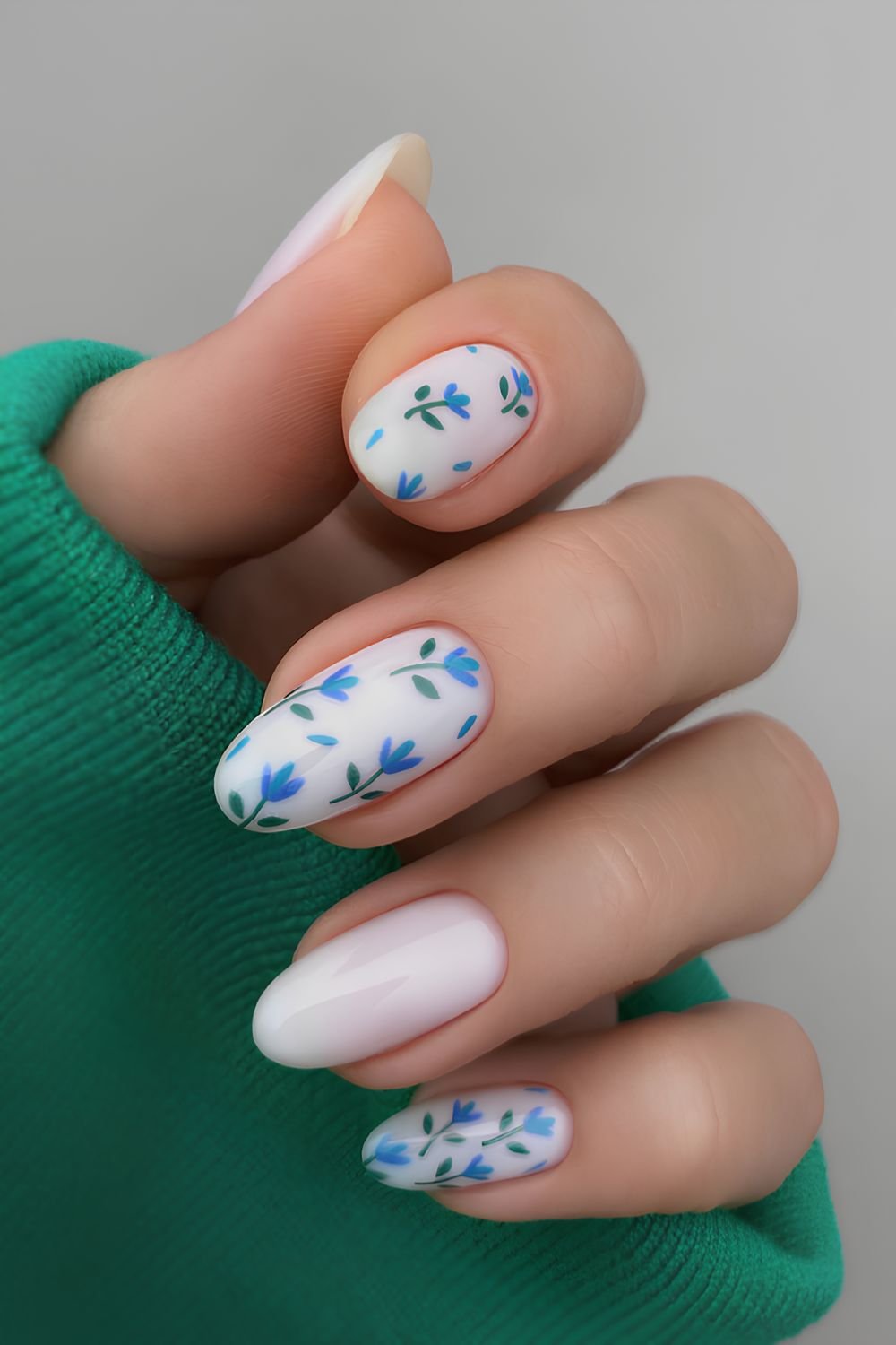 White nails with blue tulip art