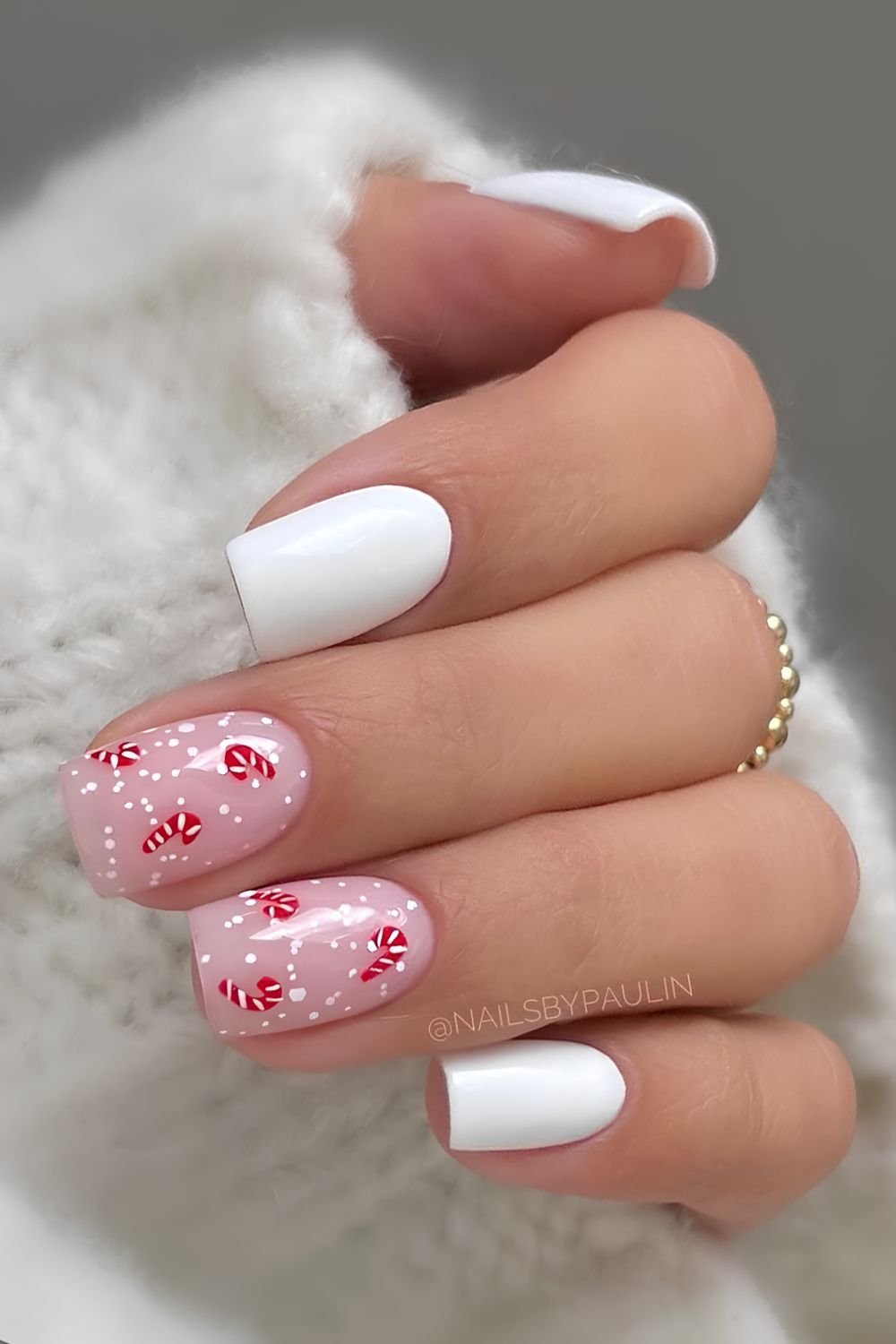 White nails with candy cane art