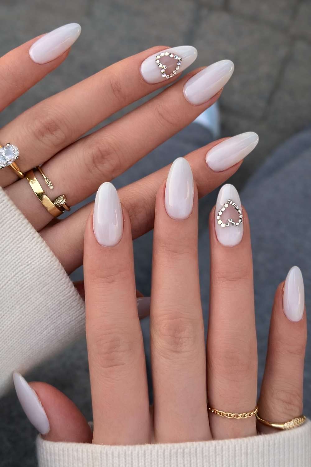 White nails with gem encrusted hearts