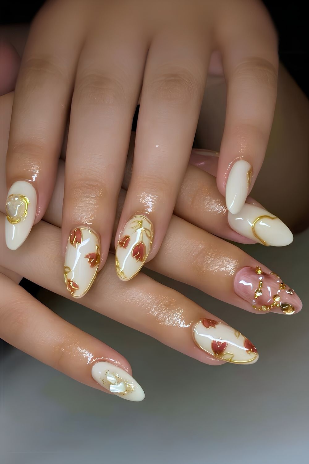 White nails with gold and tulip accent art