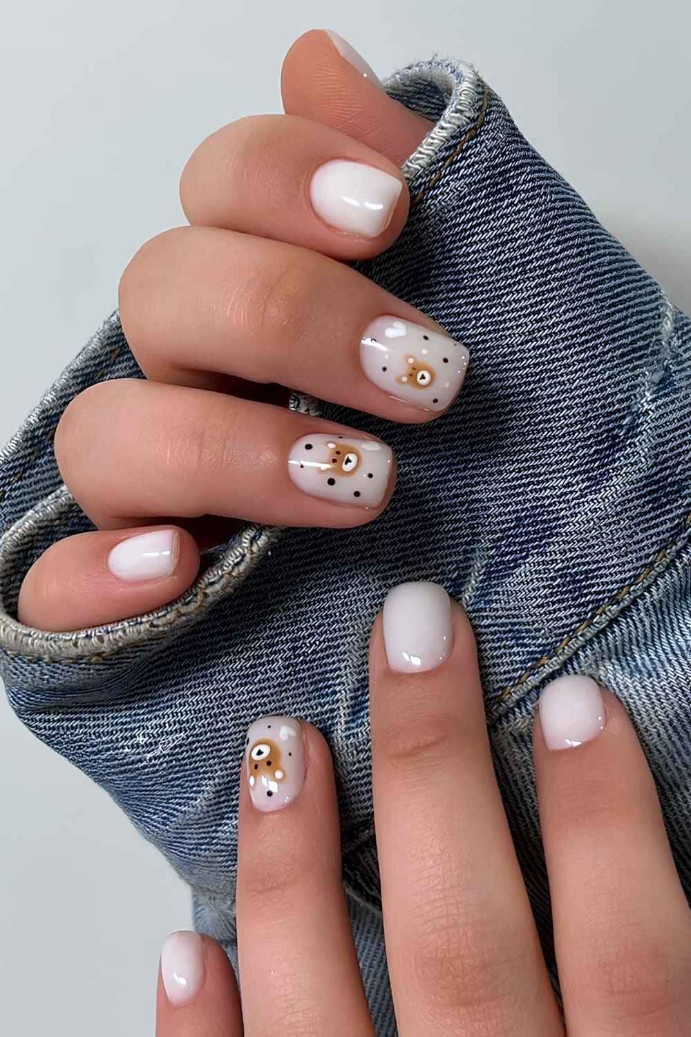 White nails with teddy bear art