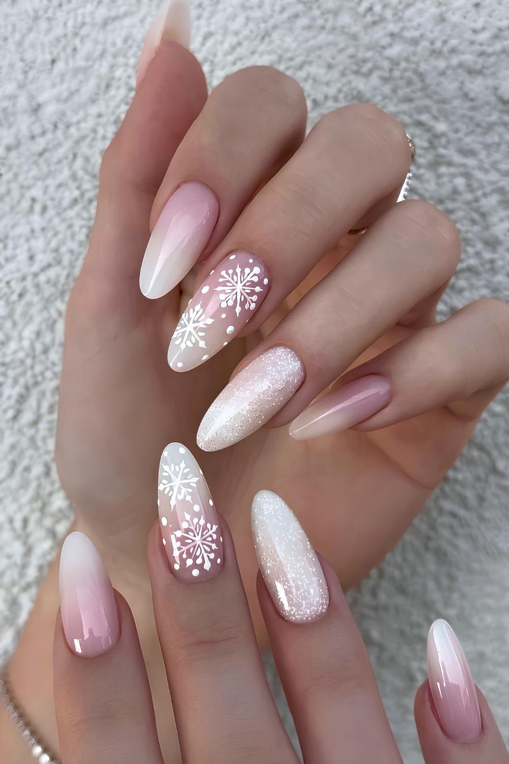 White ombre nails with glitter and snowflakes